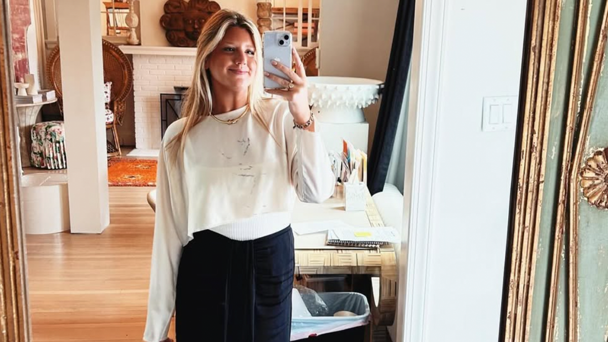 Whitney Robeson poses in a mirror for a selfie