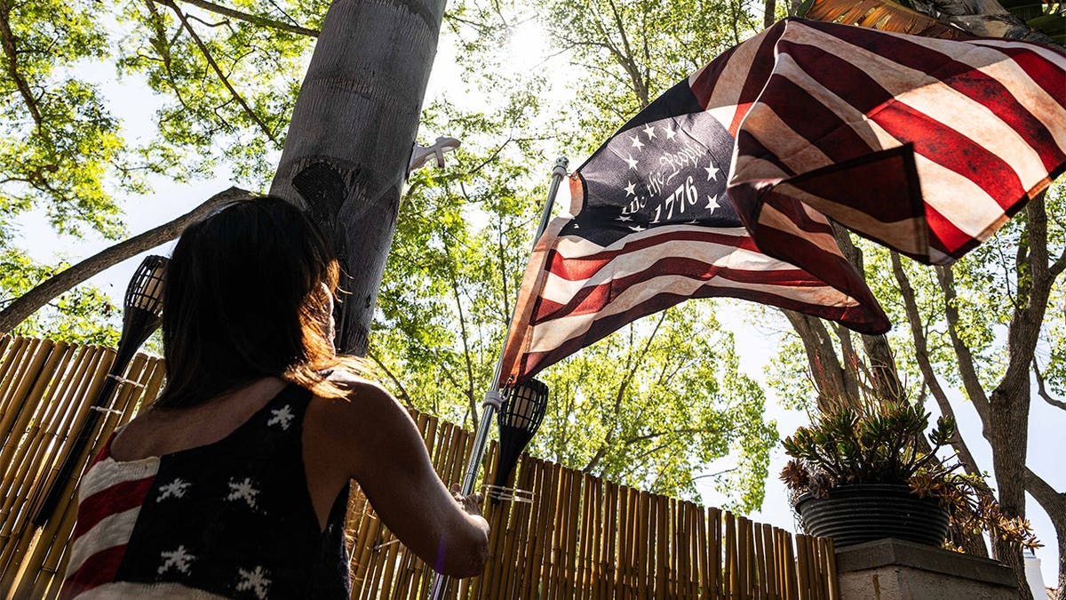Terri Collins with American flag
