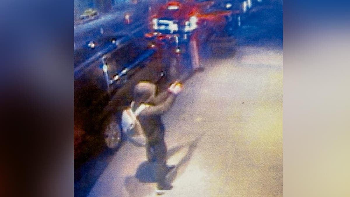 Surveillance image showing suspect in shooting death of United Healthcare CEO Brian Thompson