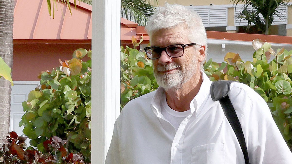 Brian Hooker standing outdoors in the Bahamas