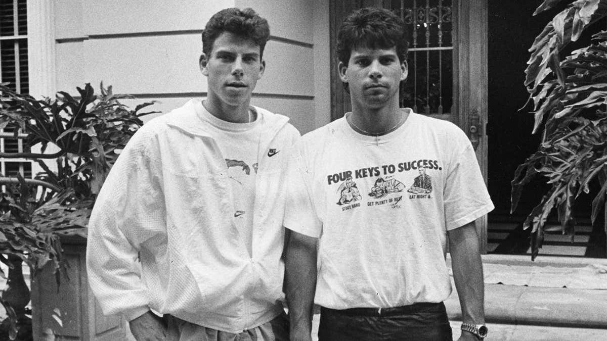 Erik Menendez and brother Lyle standing in front of their Beverly Hills home