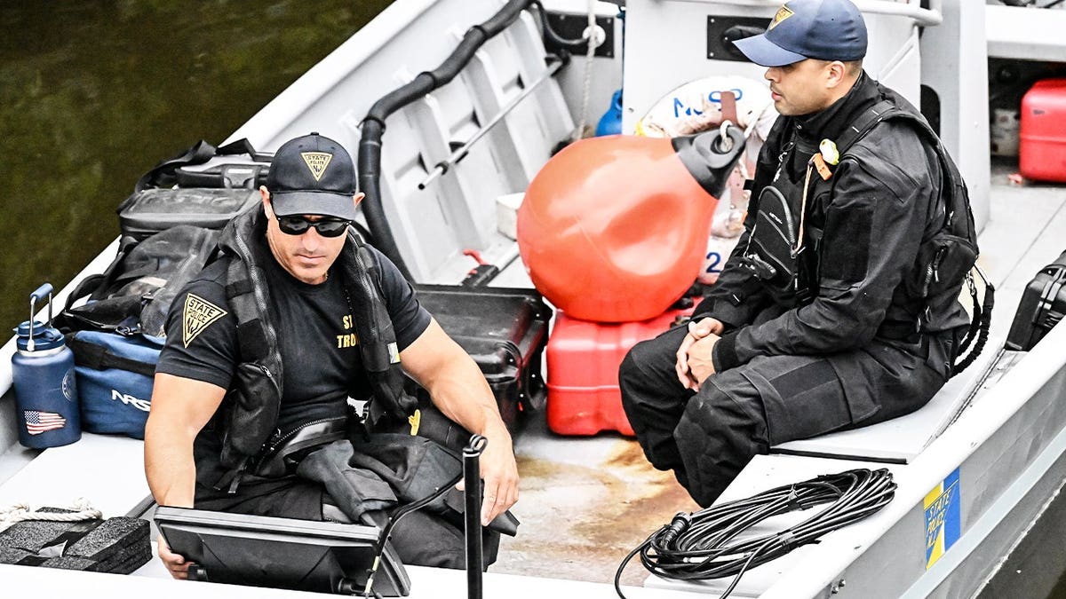 Passaic Police and other assisting towns work the scene inside of the Passaic River where a 10-year-old boy was found dead and an ongoing operation is underway to recover a 10-year-old girl after both children were in the Passaic River in the vicinity of Veterans Ct near a park in Passaic, New Jersey, United States on Thursday, July 30, 2026. Authorities canvassed the area for any clues, evidence and signs of the missing children. The investigation is active and ongoing.