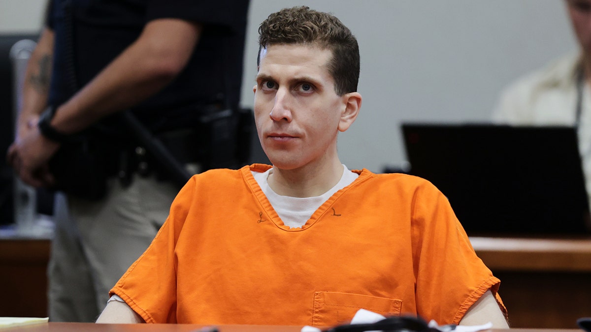 Bryan Kohberger sits in court in an orange jumpsuit.
