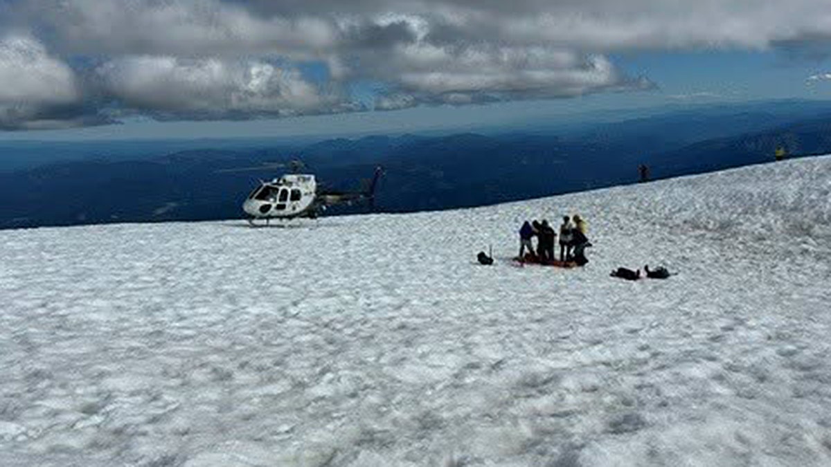 CHP helicopter lands during Mount Shasta rescue.