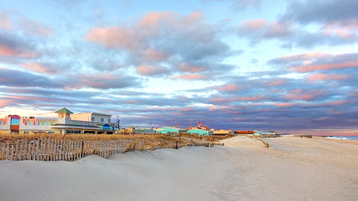 photo shows beach with boardwalk
