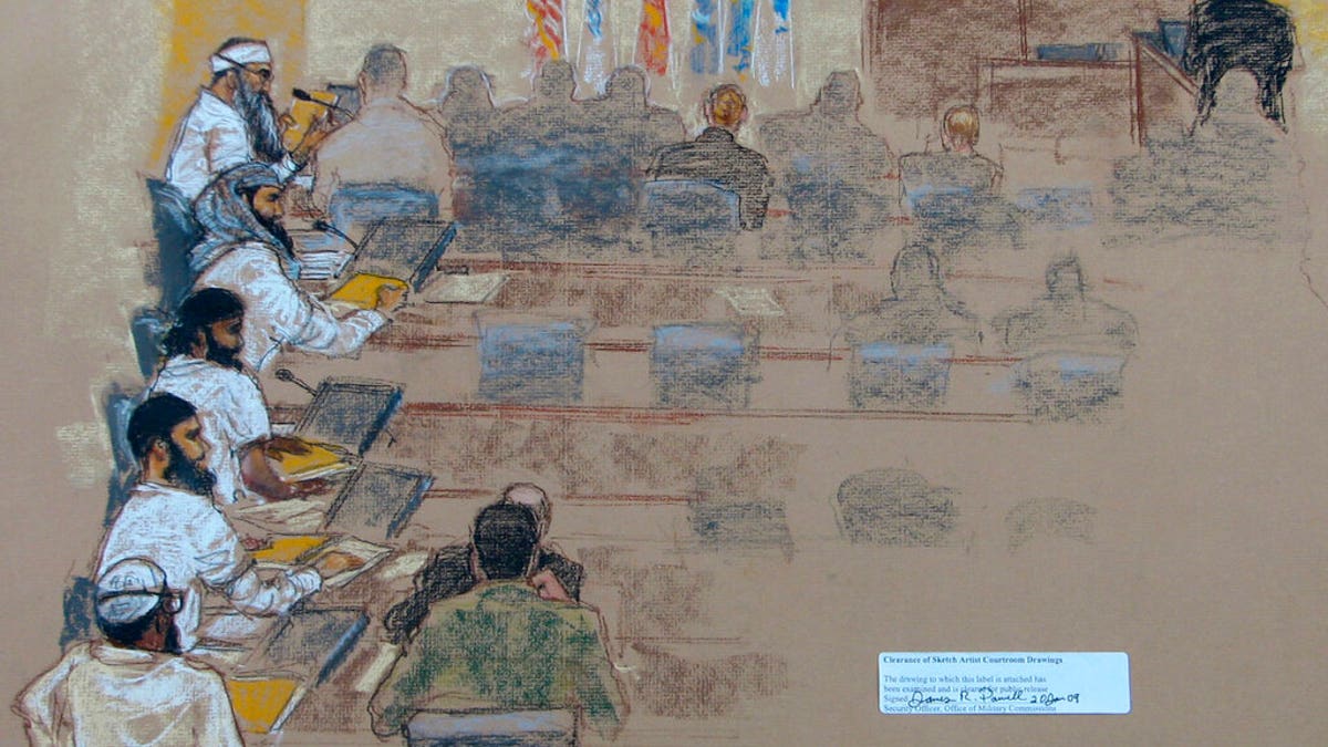 This Wednesday, Jan. 21, 2009 sketch reviewed by the U.S. military, shows, from top left, Khalid Shaikh Mohammad; Walid bin Attash; Ramzi bin al Shibh; Ali Abdul Aziz Ali, also known as Ammar al Baluchi, and Mustafa al Hawsawi attend a hearing at the U.S. Military Commissions court for war crimes at the U.S. Naval Base in Guantanamo Bay, Cuba. On Friday, Aug. 30, 2019, a military judge set Jan. 11, 2021 for the start of the long-stalled war crimes trial of the five men being held at the Guantanamo Bay prison on charges of planning and aiding the Sept. 11 terrorist attacks. (AP Photo/Janet Hamlin, Pool)