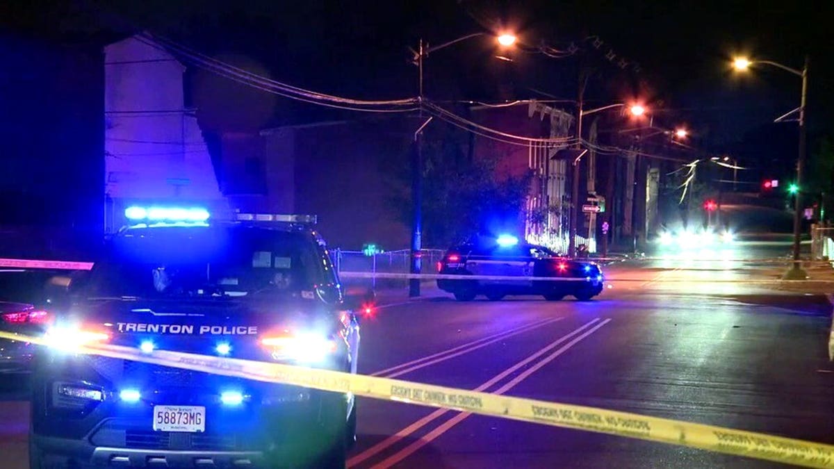 police at scene of shooting at night