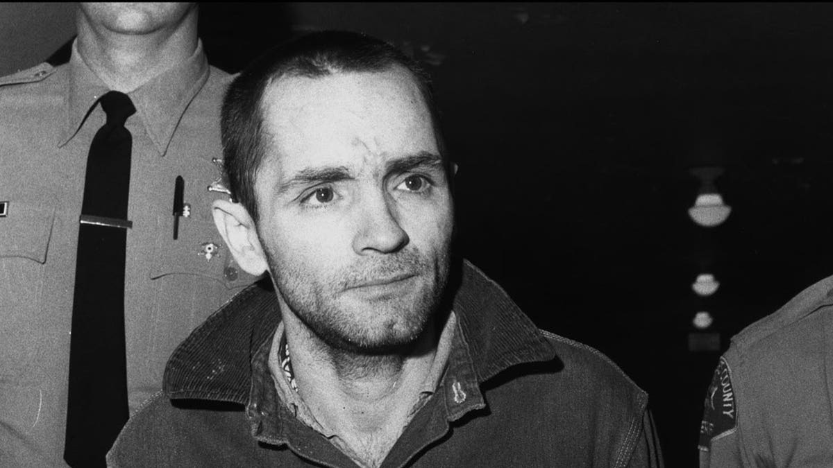 Charles Manson in a jail setting.