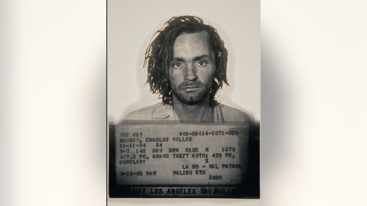 Charles Manson in a young mugshot photograph.