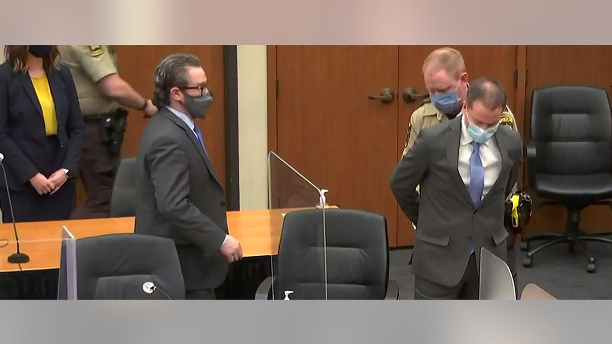Former Minneapolis police officer Derek Chauvin is handcuffed to be led away after a jury found him guilty of all charges in his trial for second-degree murder, third-degree murder and second-degree manslaughter in the death of George Floyd in Minneapolis, Minnesota, U.S. April 20, 2021 in a still image from video. Pool via REUTERS