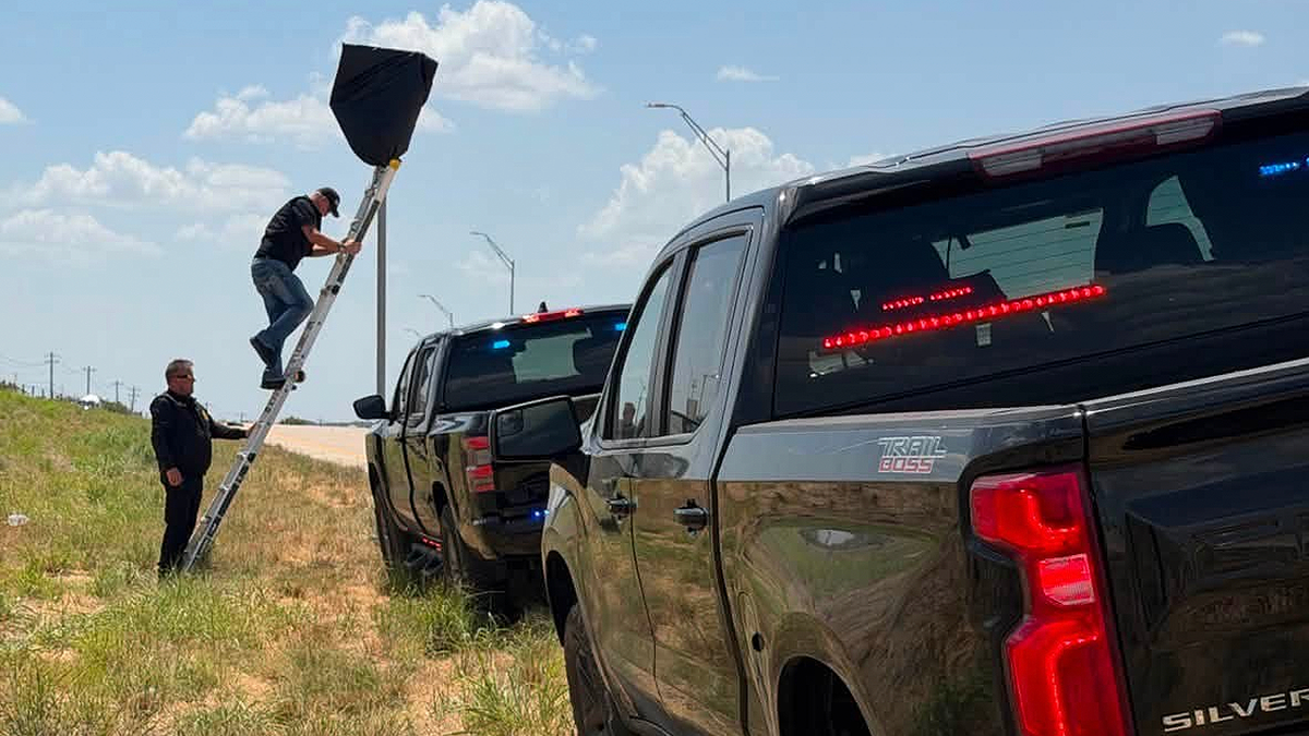 Hood County officials cover a Flock camera after the Commissioners Court directed the county’s devices be disconnected