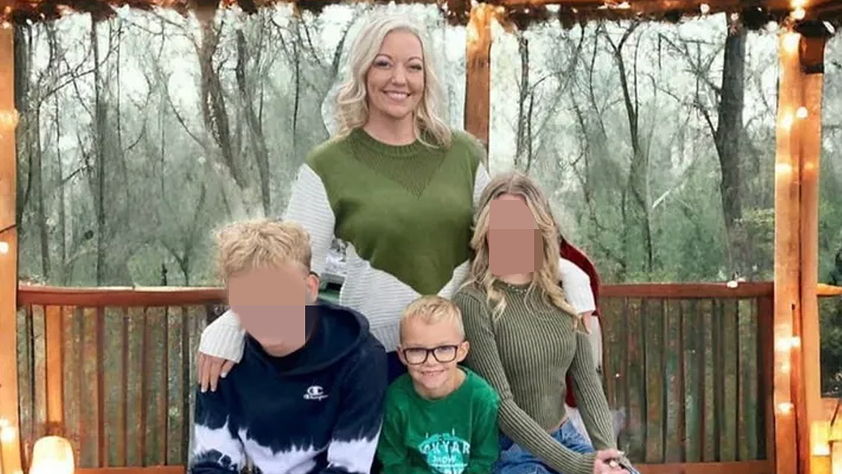 Jessica Orton Lyman and Eli Painter pose with relatives in a family photo