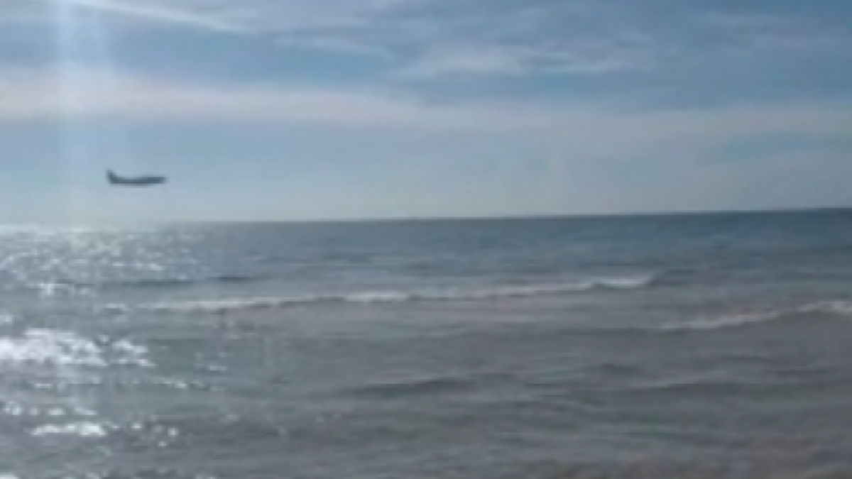 The plane was spotted flying low before crashing into the water.