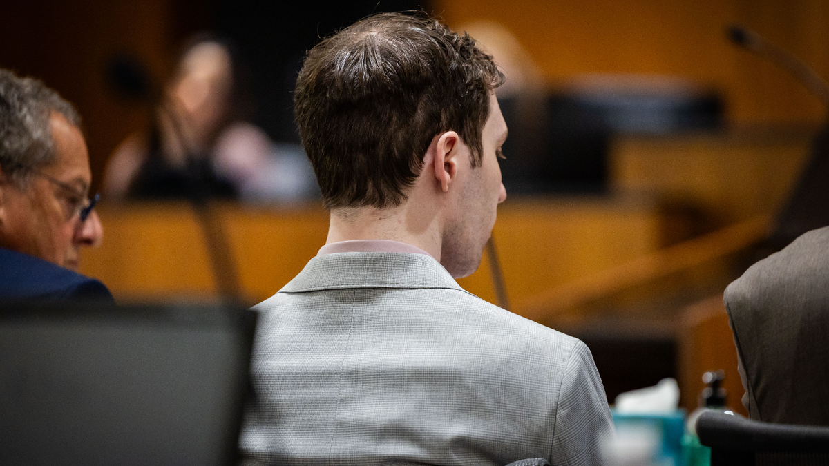 Tyler Robinson sitting in court.