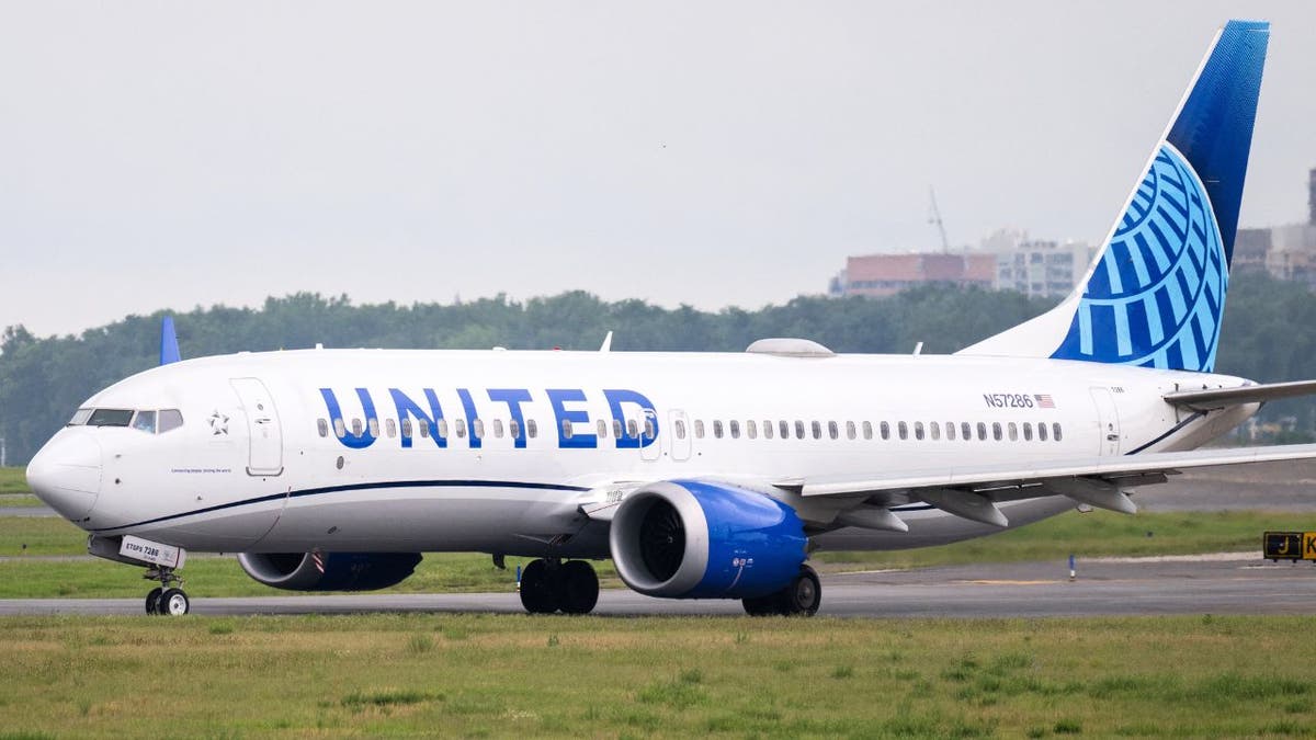 United Airlines Boeing 737 MAX airplane on runway