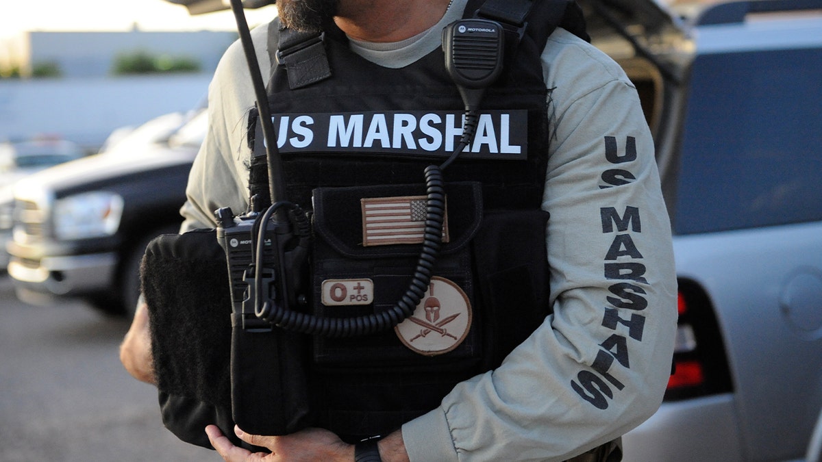 US MARSHAL wearing uniform
