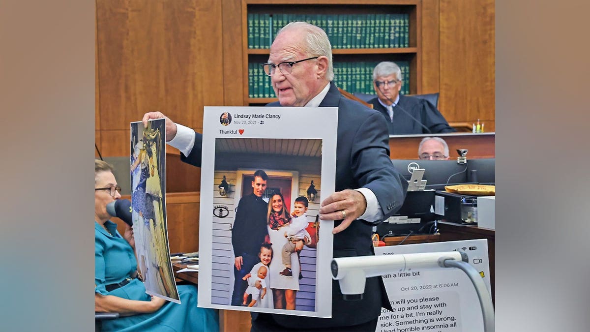 Reddington displaying a photo in court.