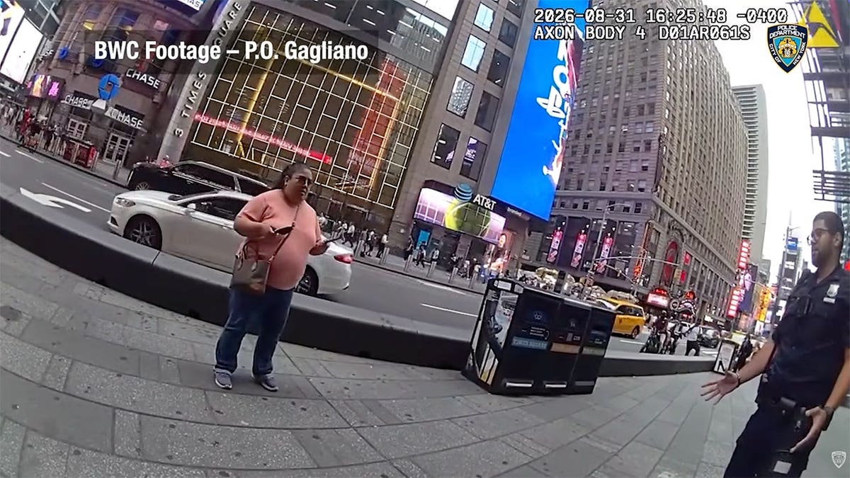 NYPD body camera image shows officers confronting a woman armed with two knives in Times Square moments before police opened fire. Is this conversation helpful so far?