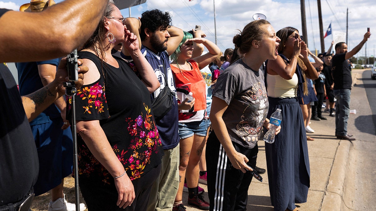 Protesters confront police officers (not picured) after city officials said that a U.S. Immigration and Customs Enforcement (ICE) agent shot a person earlier in the day in Austin, Texas, U.S. September 20, 2026. REUTERS/Nuri Vallbona