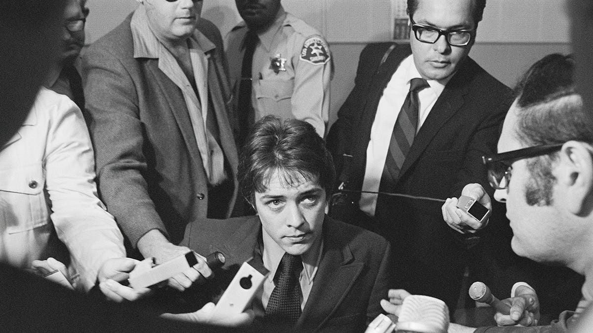 Robert Kenneth Beausoleil talks with newsmen after a first-degree murder verdict.