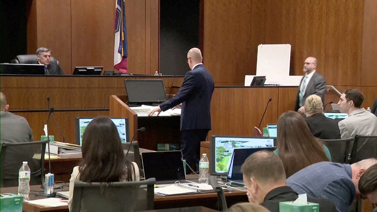 Tyler Robinson seen in a courtroom during a hearing.
