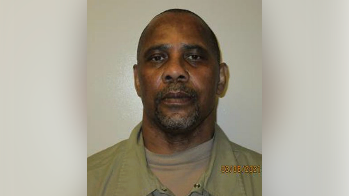 2021 mugshot of Merle Wakefield wearing a green shirt