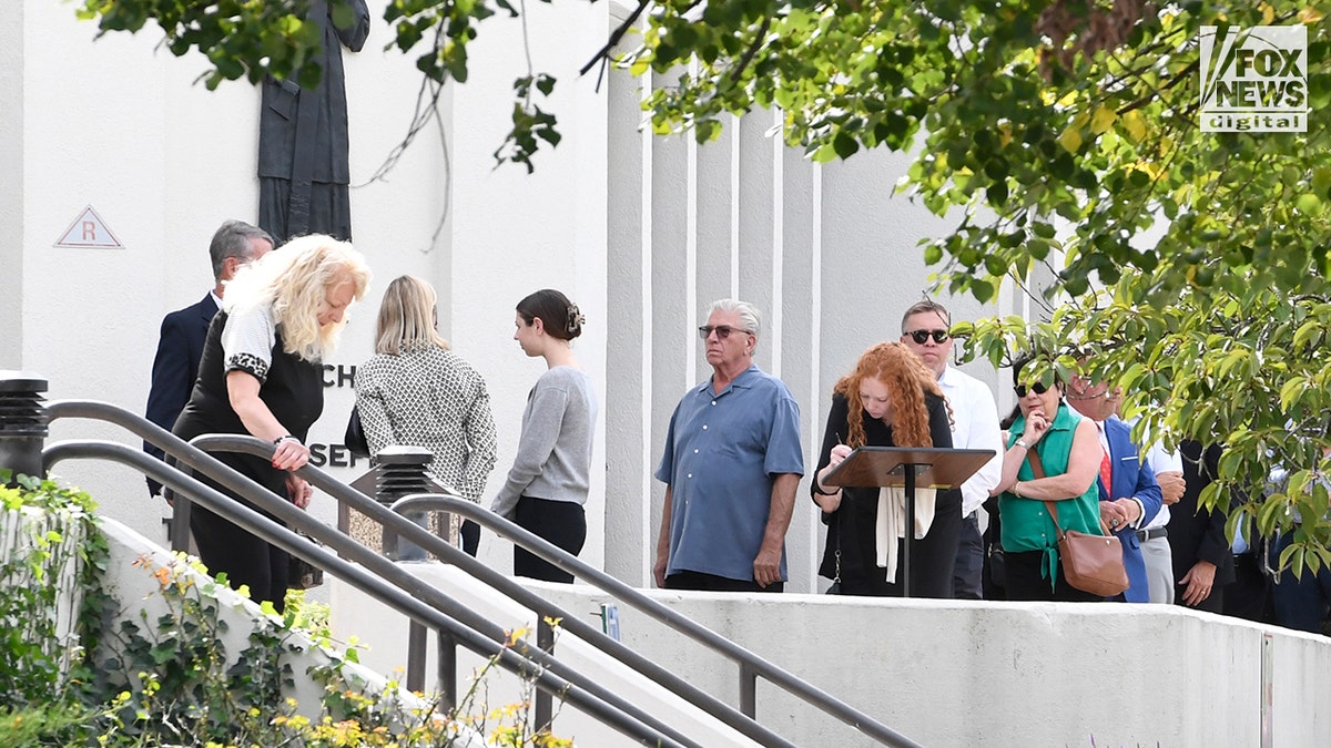Mourners sign a guest book at the wake of Erin Piacenti, held at St Joseph's church in Mendham Borough, NJ, Tuesday, Spetember 8, 2026 Piacenti was killed in a random knife attack in Times Square last month. (Rashid Umar Abbasi for Fox News Digital)
