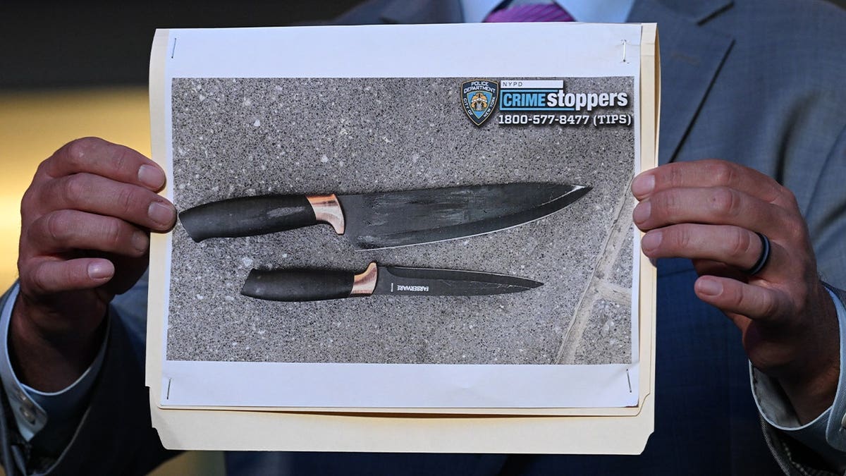 A photo showing two knives recovered at the scene is displayed during a press conference following a fatal stabbing incident in Times Square near West 42nd Street and Seventh Avenue in Manhattan, New York, United States, on August 31, 2026.