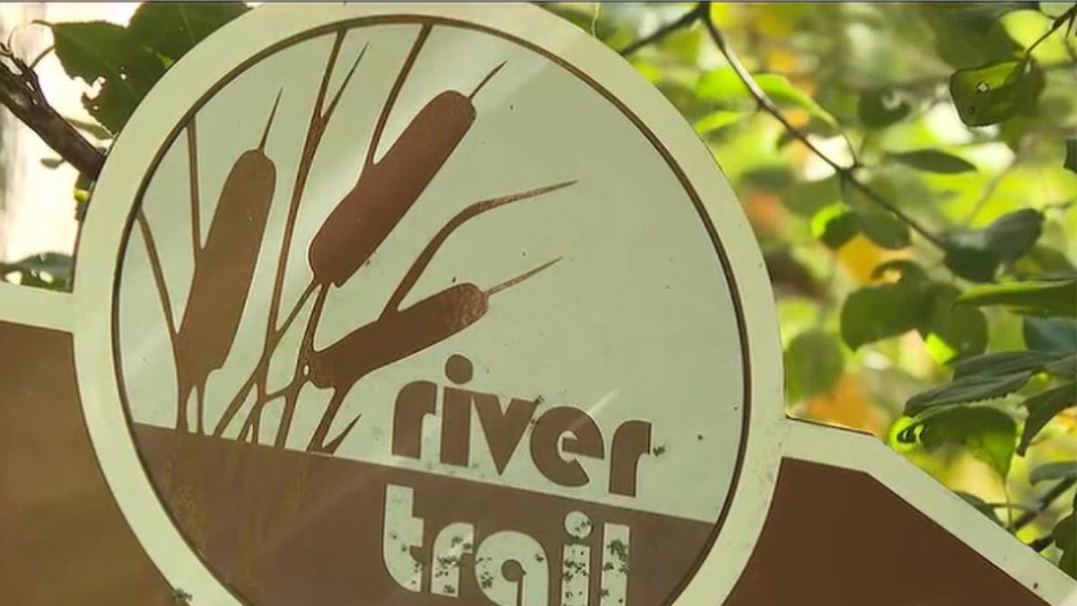 image shows Lansing River Trail sign