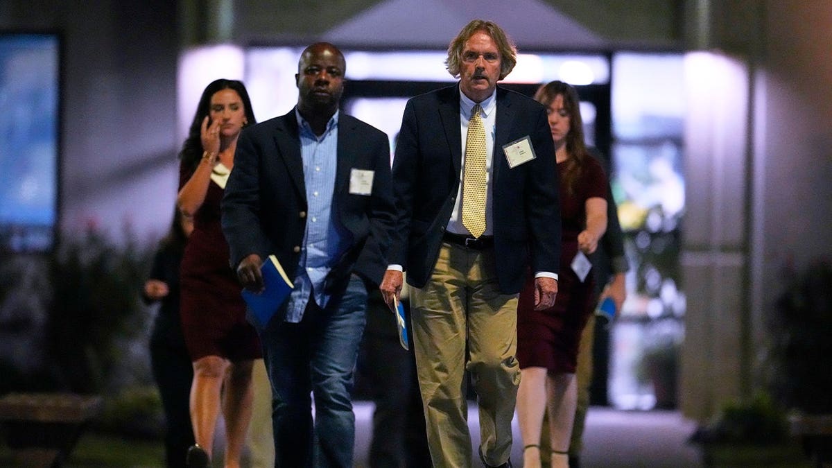 Media witnesses leave Riverbend Maximum Security Institution after the execution of Christa Pike was halted Wednesday, Sept. 30, 2026, in Nashville, Tenn.