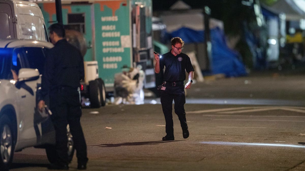 The Tallahassee Police Department investigates the scene of a shooting that occurred on Perry Street, behind Bragg Memorial Stadium