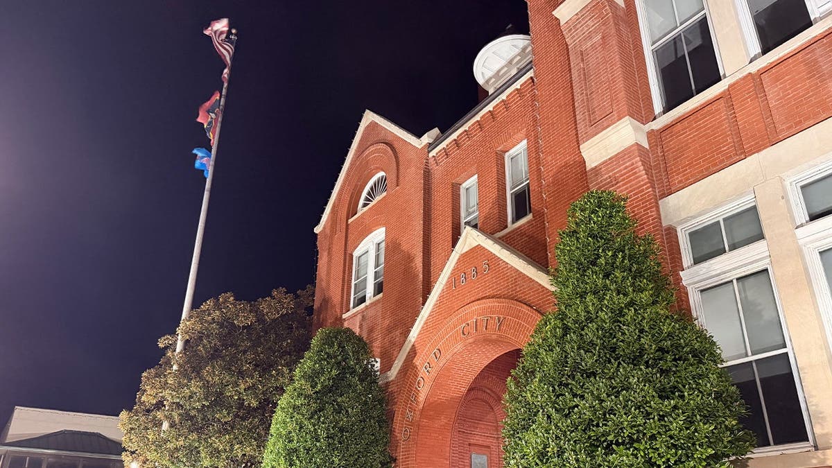 photo shows worm's eye view of city hall