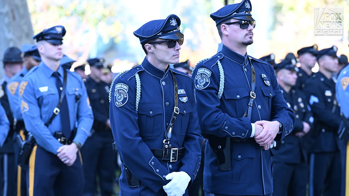 Members of the West Chester Police Honor Guard gather outside Cathedral Basilica to honor the life of the late Philadelphia Police Officer Shane Seiber in Philadelphia, Pennsylvania, United States on Tuesday, October 20, 2026. Police Officer Shane Seiber will be remembered at a funeral service after being killed in the line of duty. Credit: Kyle Mazza/CNP for Fox News Digital