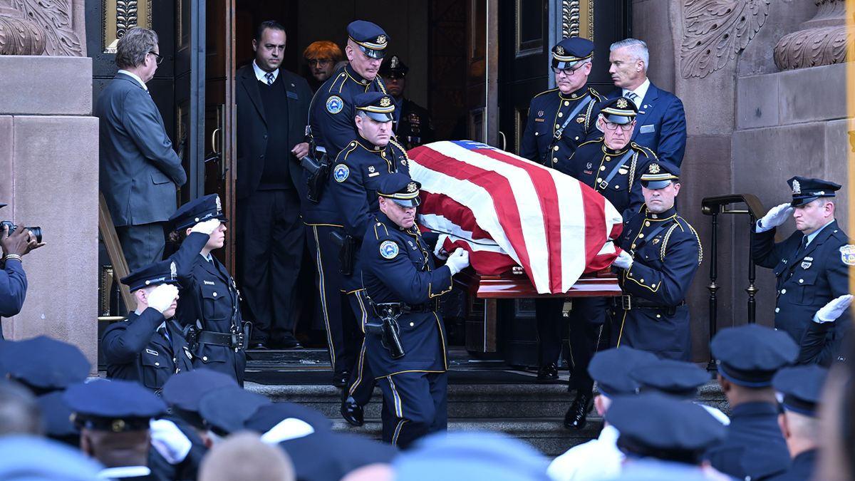 Officers pay their respects at the funeral of Philadelphia Police Sgt. Shane Seiber